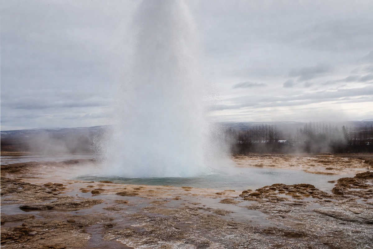 Strokkur erupting in the Geysir geothermal field on the Golden Circle in Iceland