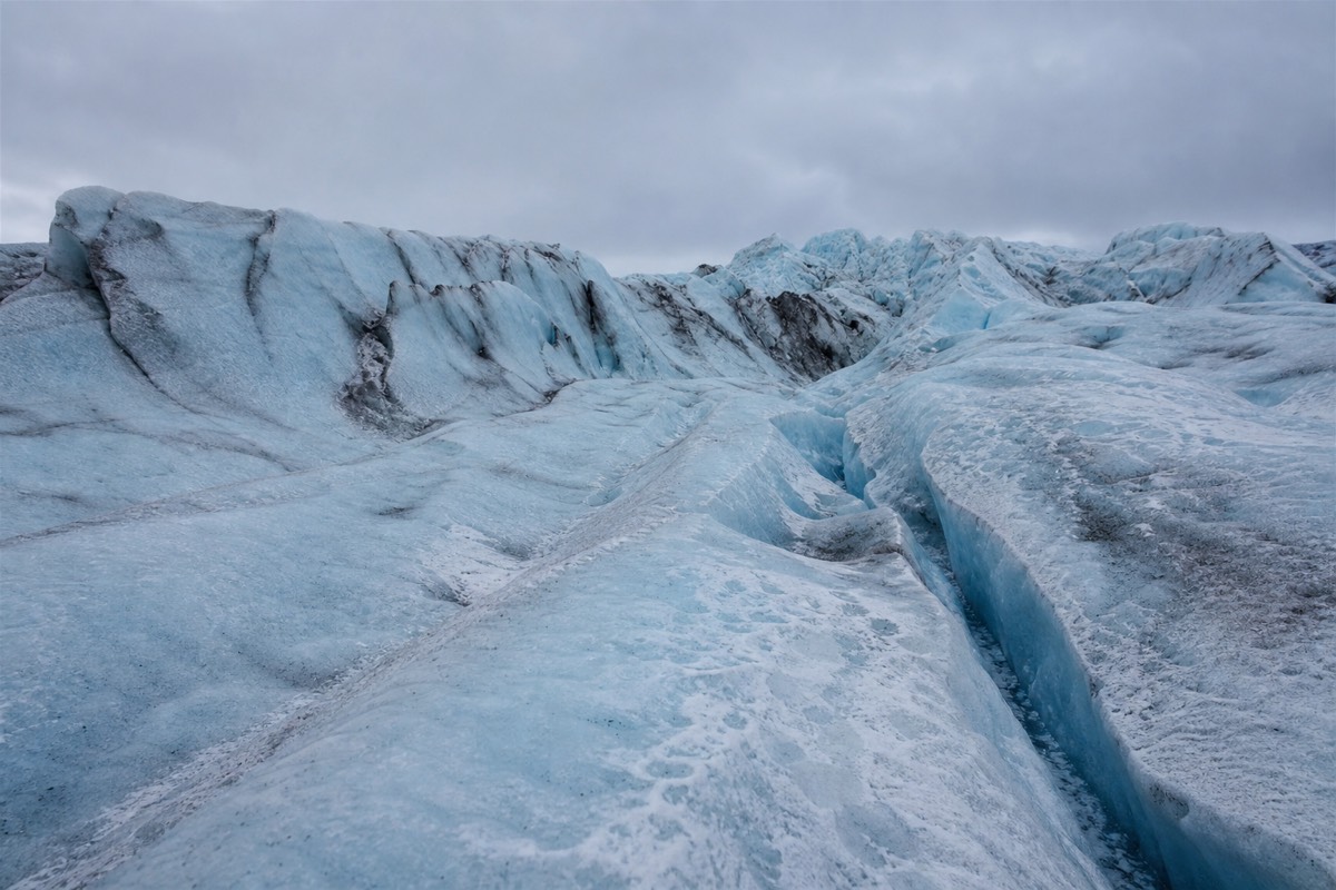 Blue glacier ice on a guided glacier hike in Iceland