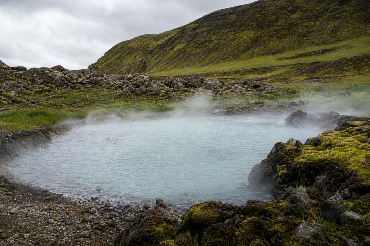 A natural geothermal hot spring among the Diamond Circle sites in the Icelandic countryside near Lake Mývatn