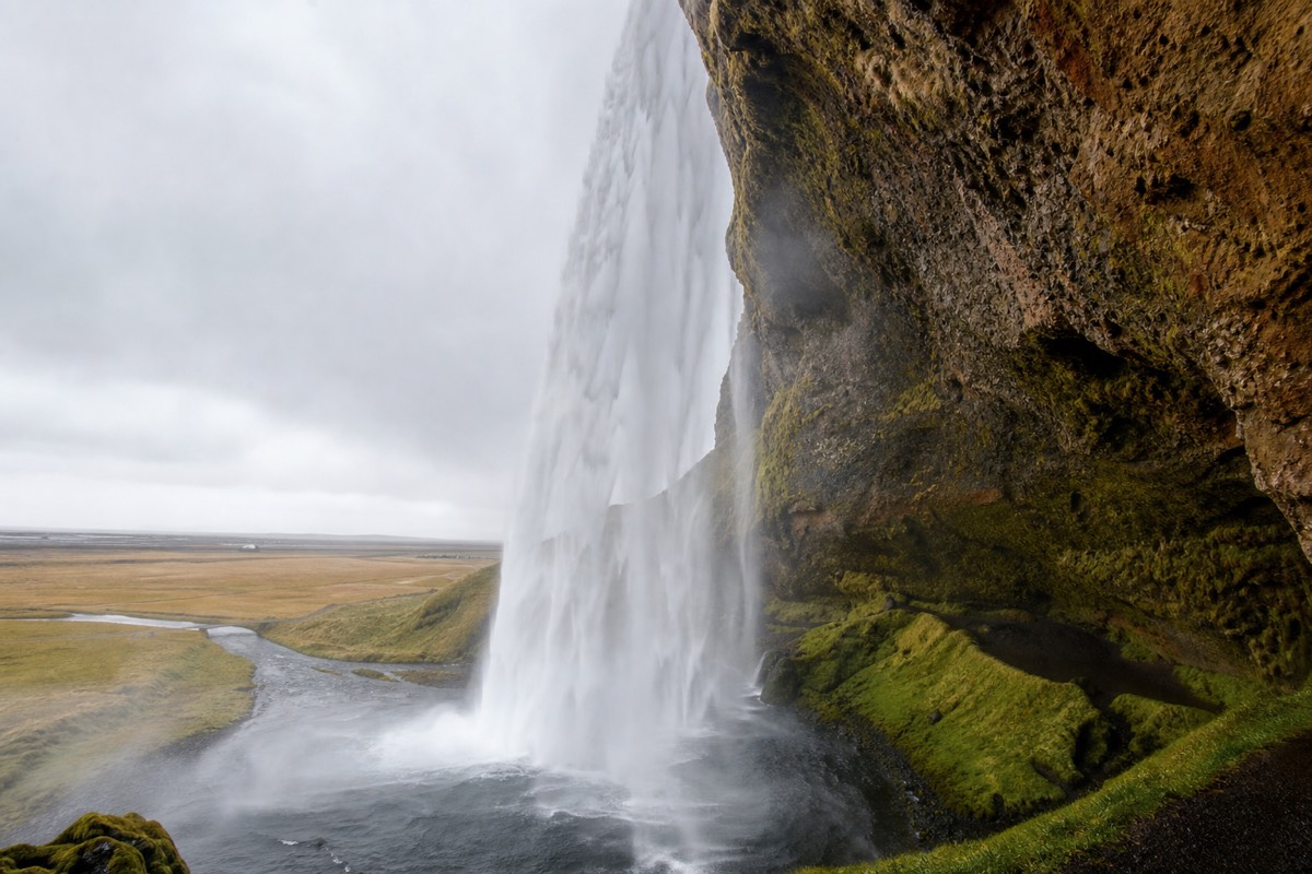 Seljalandsfoss on Iceland's South Coast, with the path behind the falling water
